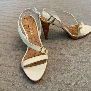 White patent leather 3 inch sandals.